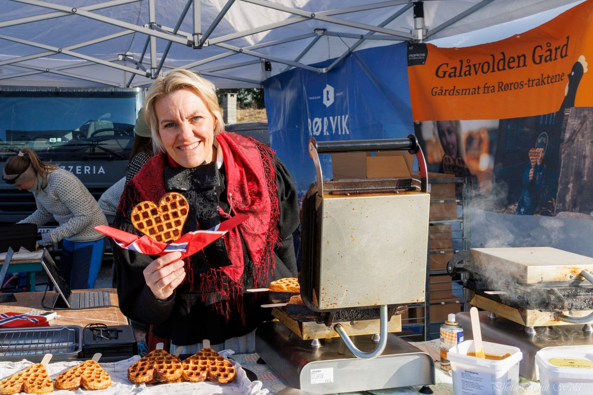 Woman holding a World Championship waffle.